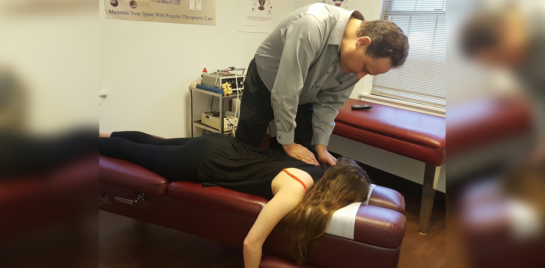 Dr. Leonard Fox performing a chiropractic adjustment on a patient at Georgetown Chiropractic in Wilton, CT